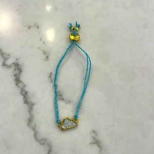 I am selling this blue bracelet that has a cloud on it